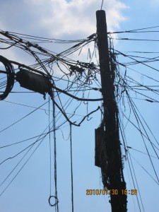 Melted wires on a telephone pole.